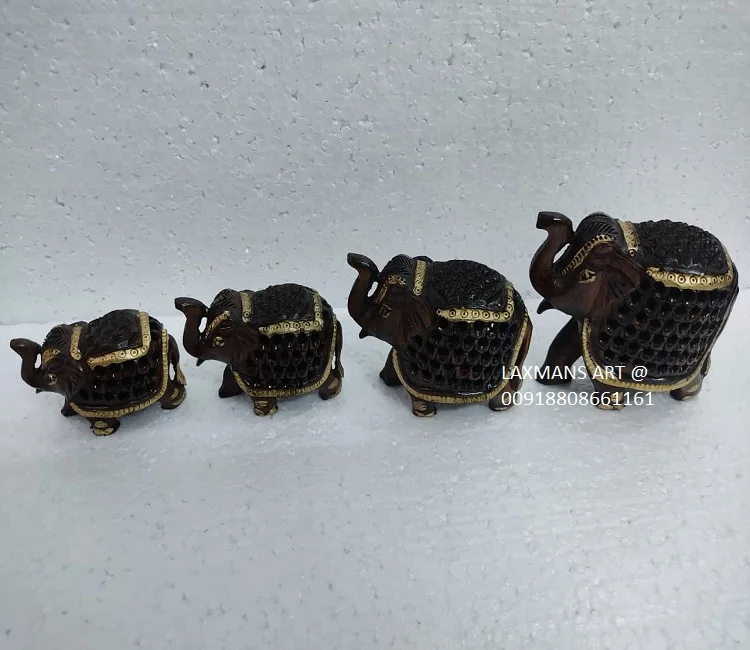 wooden carved elephant statues set 4 pcs elephant set wooden decorative elehphant statue set from india wooden elephant