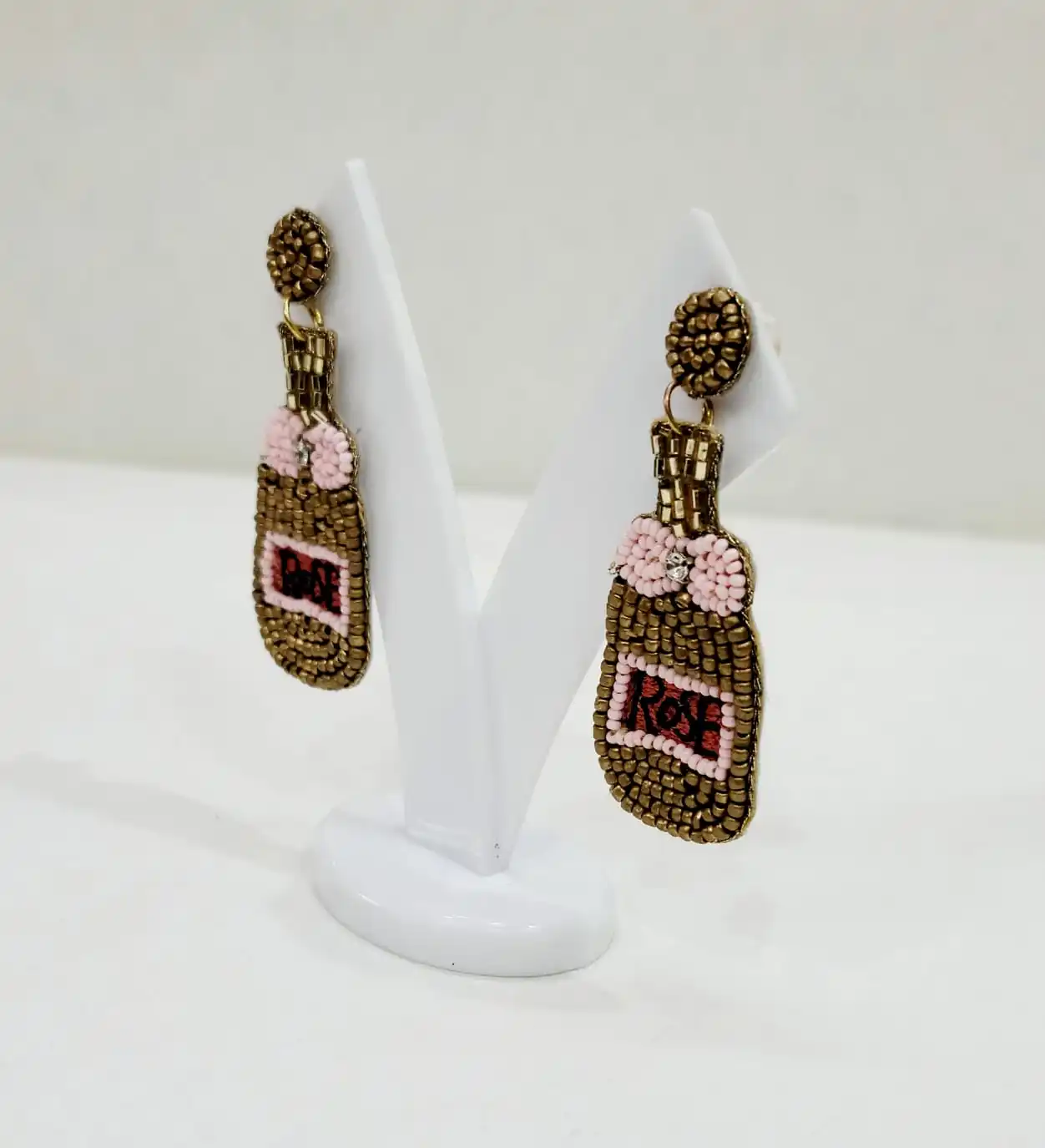 Женские серьги из бисера