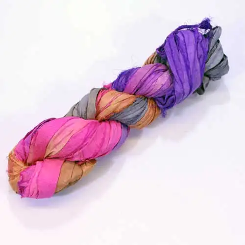 multii colored sari silk ribbon yarns made from recycled sari silk fabric suitable for yarn and fiber stores