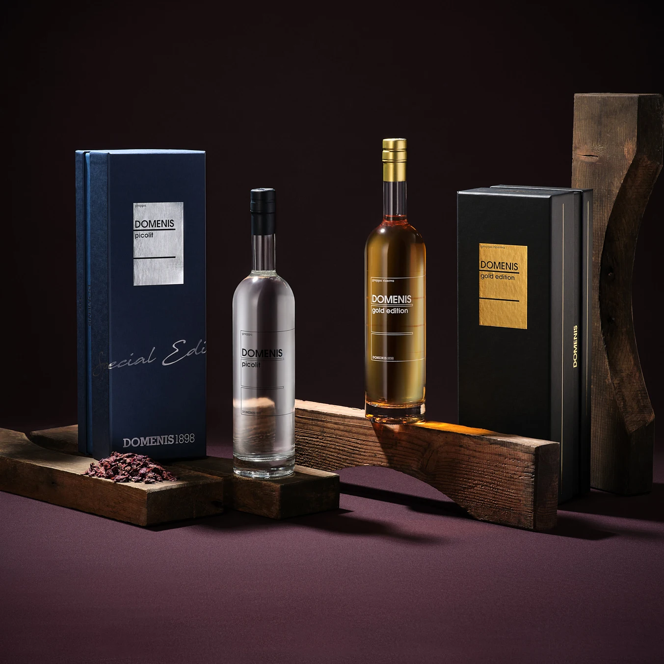 Exclusive Riserva Grappa DOMENIS Gold Edition 70 cl elegant glass bottle with a refined case