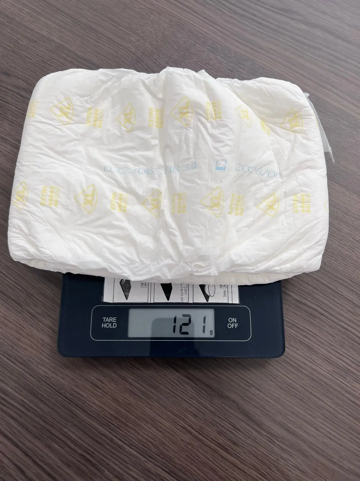 Premium adult diapers in compressed bales (EU)