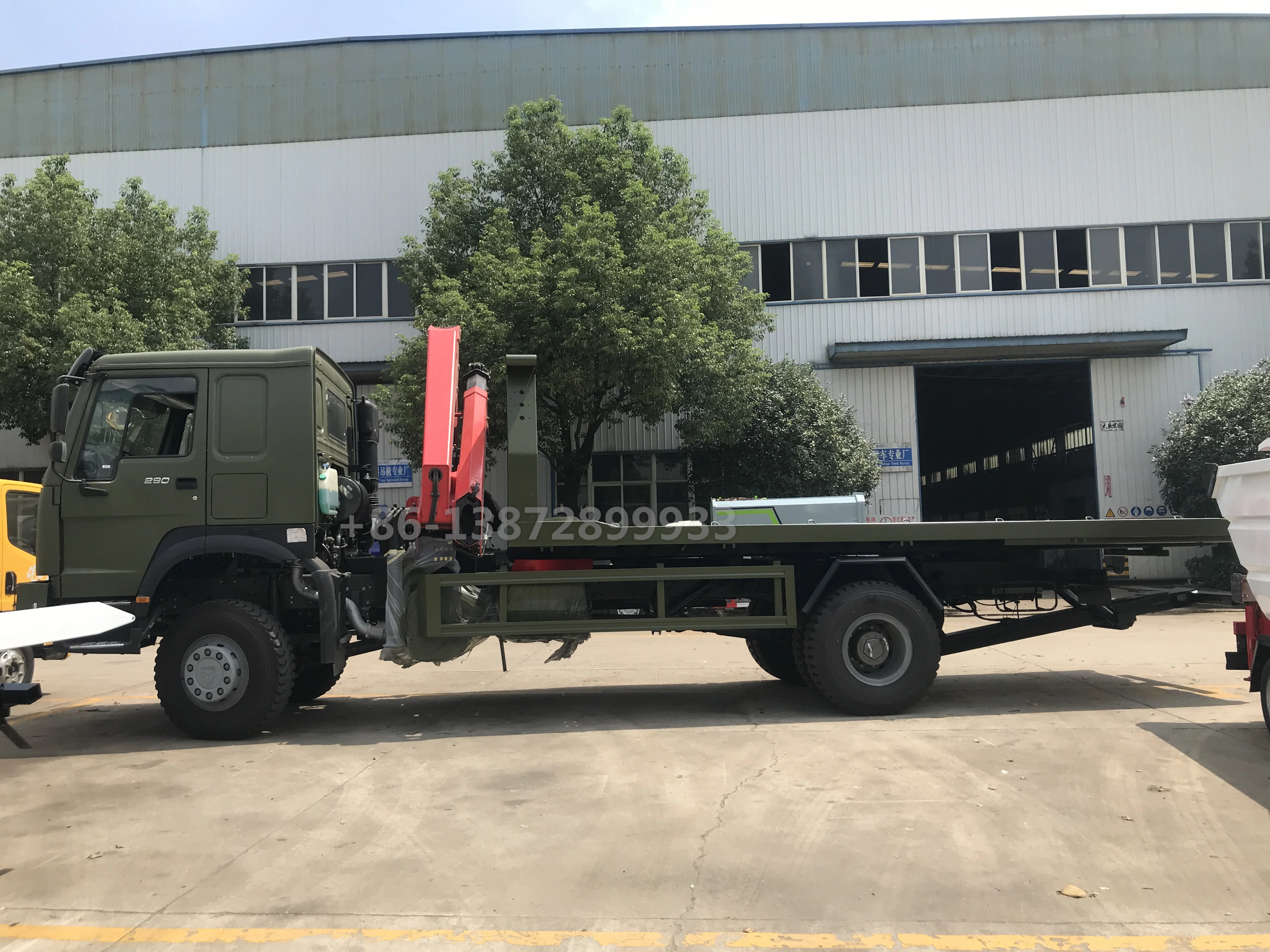 Sinotruk Howo 8-ton flatbed wrecker tow truck japan for sale with 7-ton Sany folding crane