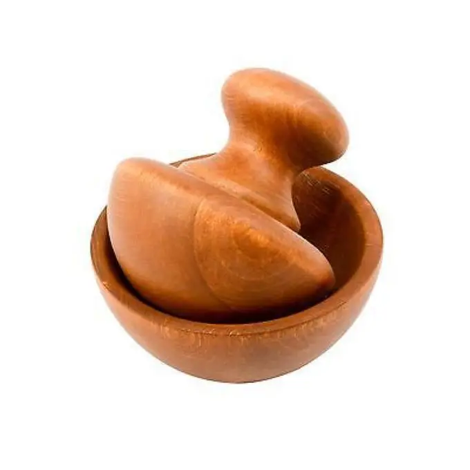 Large wooden mortar and pestle has items of garlic masher bowl, granite mortar and mortar salt.