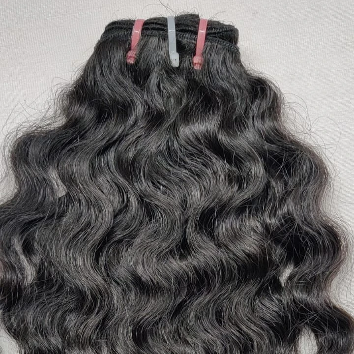 Wholesale cheap price natural unprocessed curly weft hair raw indian Human Hair extensions