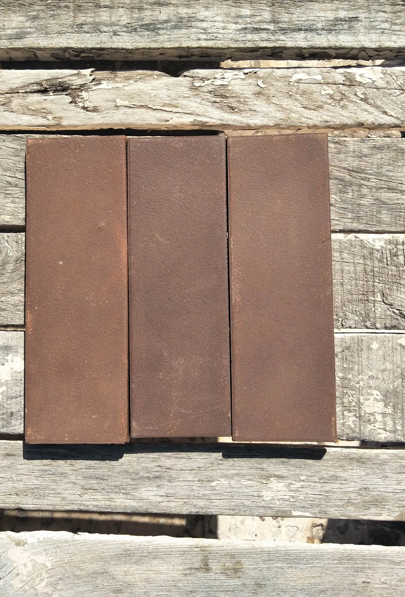 Brown clay terracotta wall cladding and clay floor tiles for garden indoor outdoor floor and wall brick covering cladding