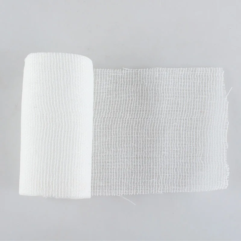 Wholesale Conforming Stretch Soft Adhesive Surgical Plain Elastic Sterile Wrapping Gauze Roll Bandage With Woven Sides