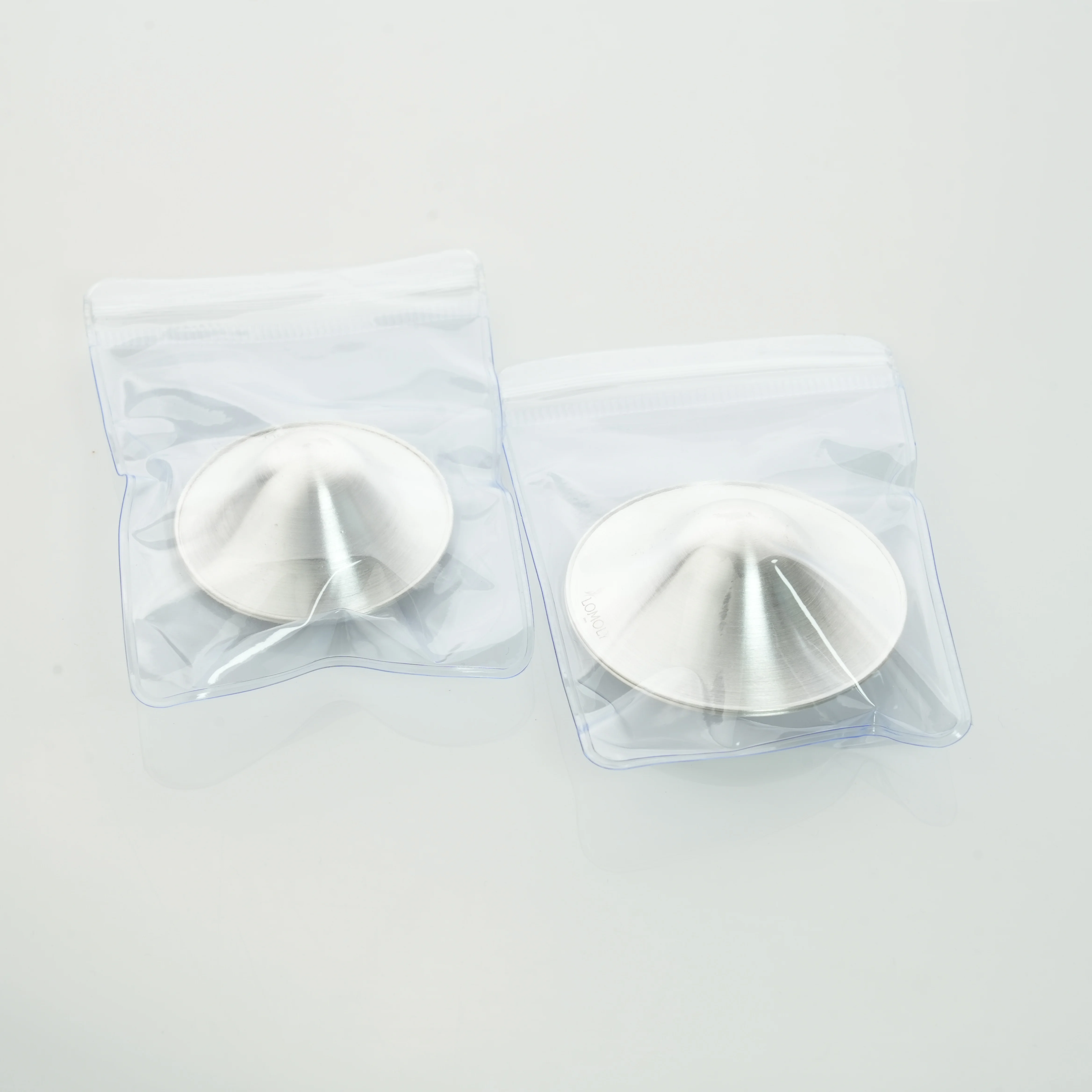 Хит продаж прозрачные неклеевые ультратонкие женские липкие серебряные накладки на соски водонепроницаемые оптовая продажа для кормления грудью