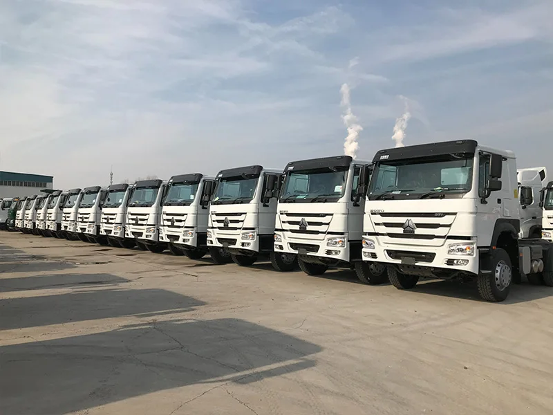 Sinotruk HOWO7 6X4 Tractor Truck Coal Loading Two Flatbed Semitrailer Container Trailer Container Dump Skeleton Truck