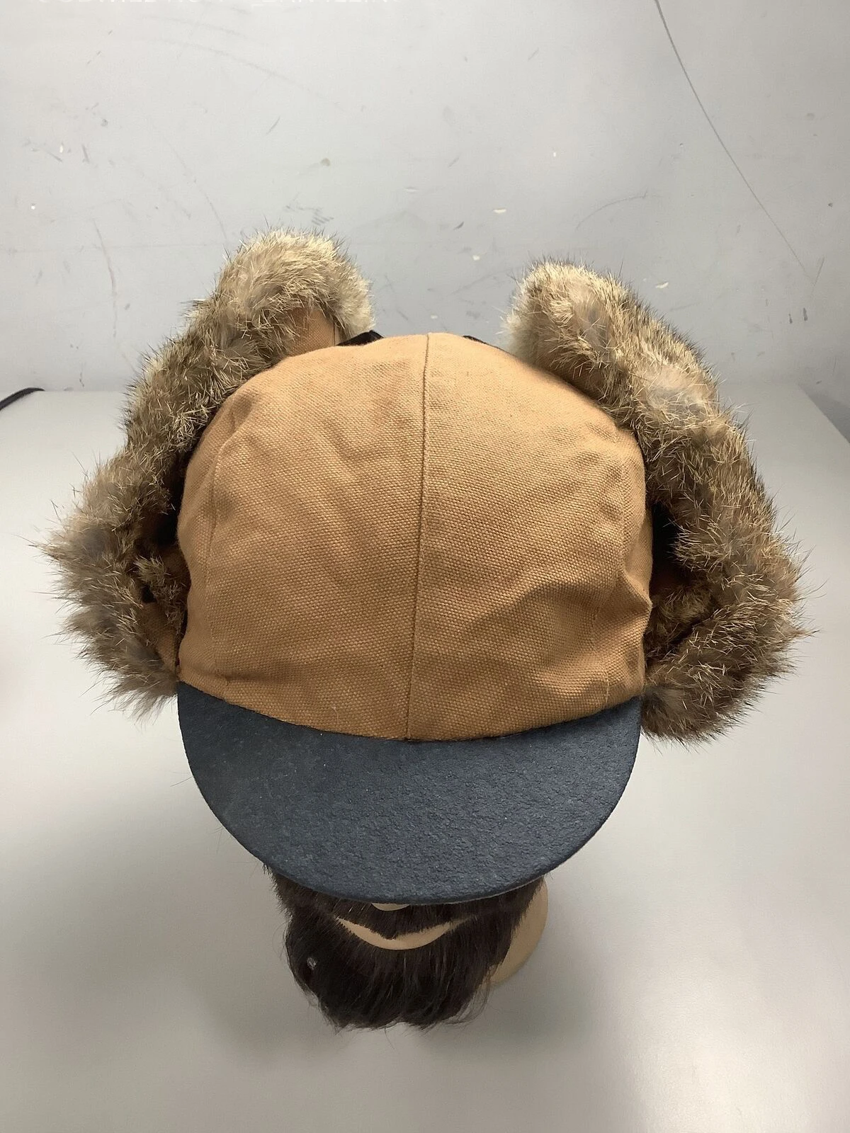 Fully customable wool Russian Aviator cap for men with warm fur lining and adjustable chin strap for winter and skiing