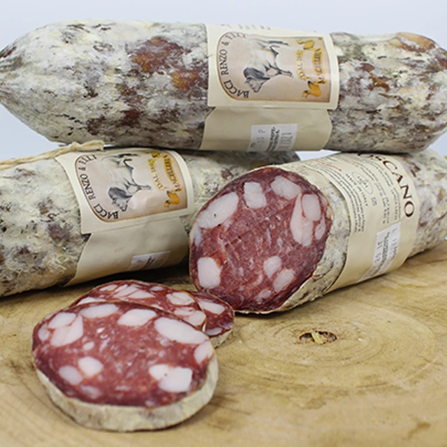 Salame typican tuscany cured PGI pork meat salami tasty with garlic and black pepper