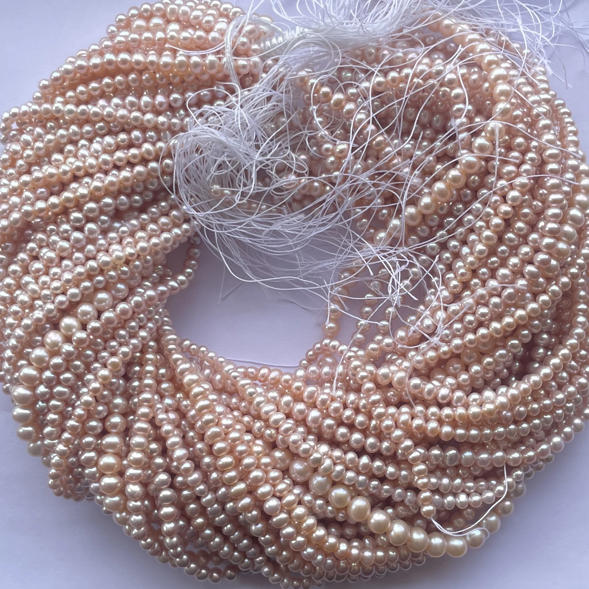 4mm 5mm 6mm 7mm Natural Rose Gold Color Freshwater Pearl Stone Round Beads Strands at Wholesale Price Cultured Pearls Factory