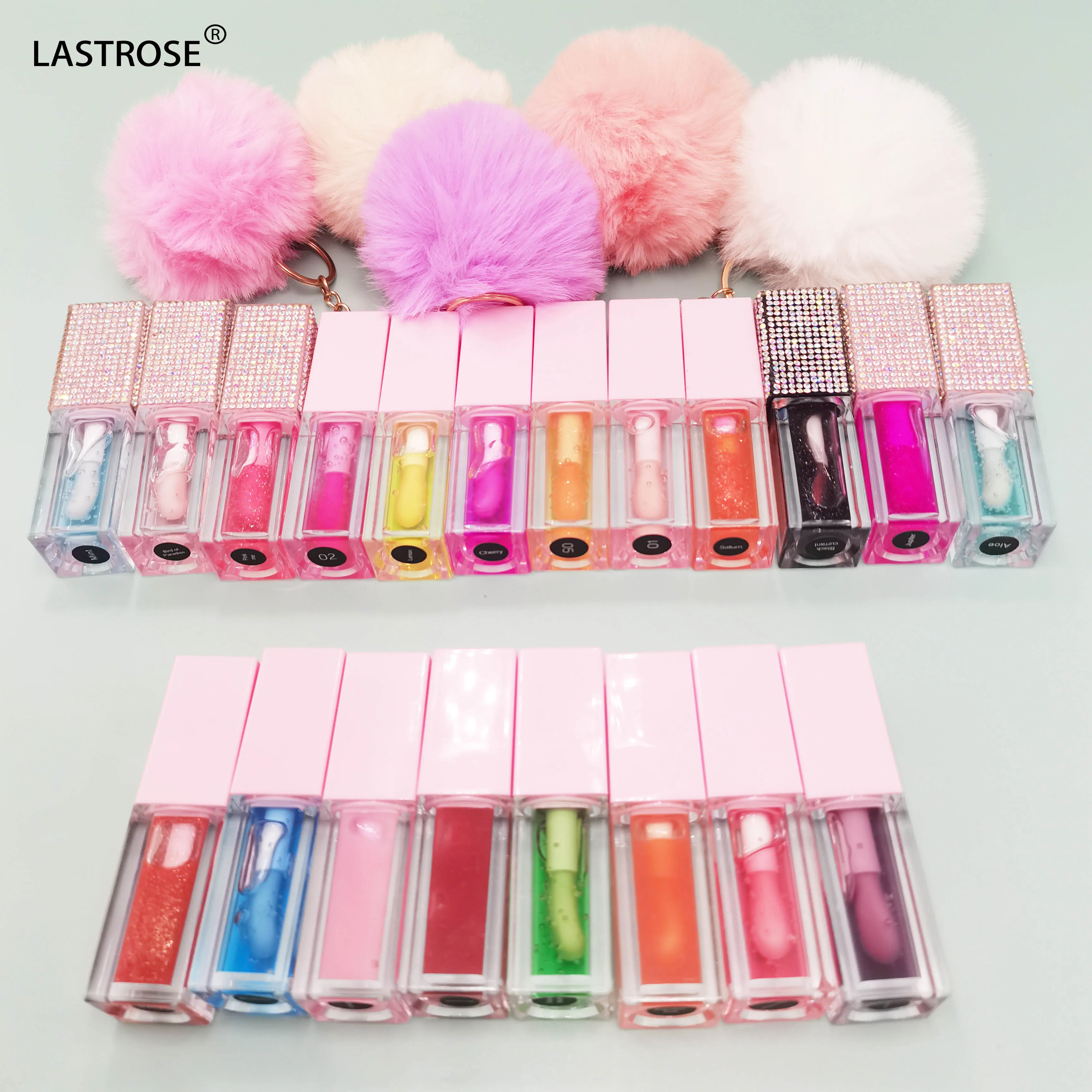 Wholesale Watermelon Lip Plumping Brown Tinted Lip Glow  Coconut Oil Flavouring pink Lip Oil with Pompon Private Label