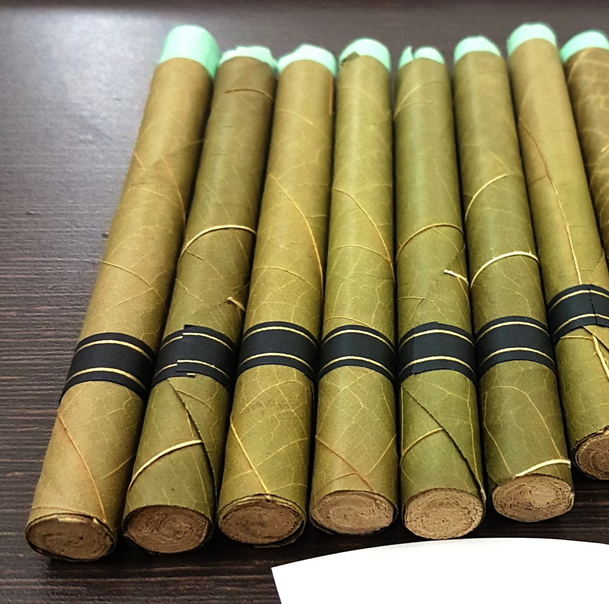 Hand Rolled Palm Leaf Best Price in market Palm Leaf Rolls in wood & glass tips all sizes Rollies Queen & King sizes bulk supply