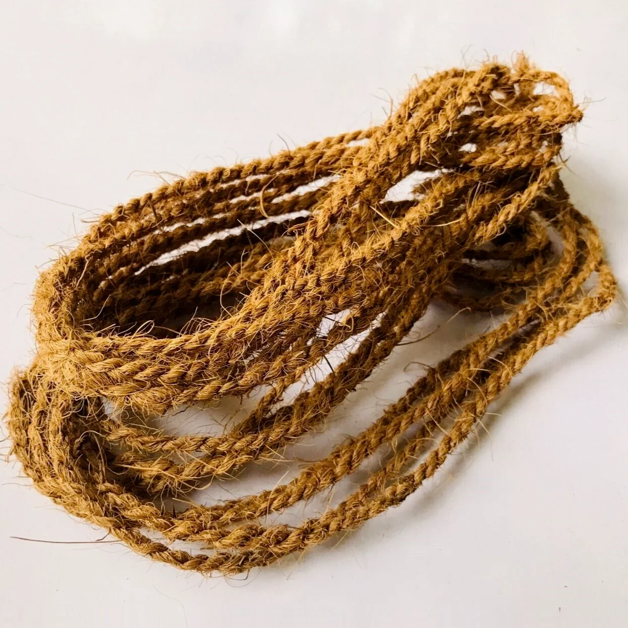 Coir fiber twisted yarn rope cheap price natural geotextile handweaving coconut husk ropes wholesale