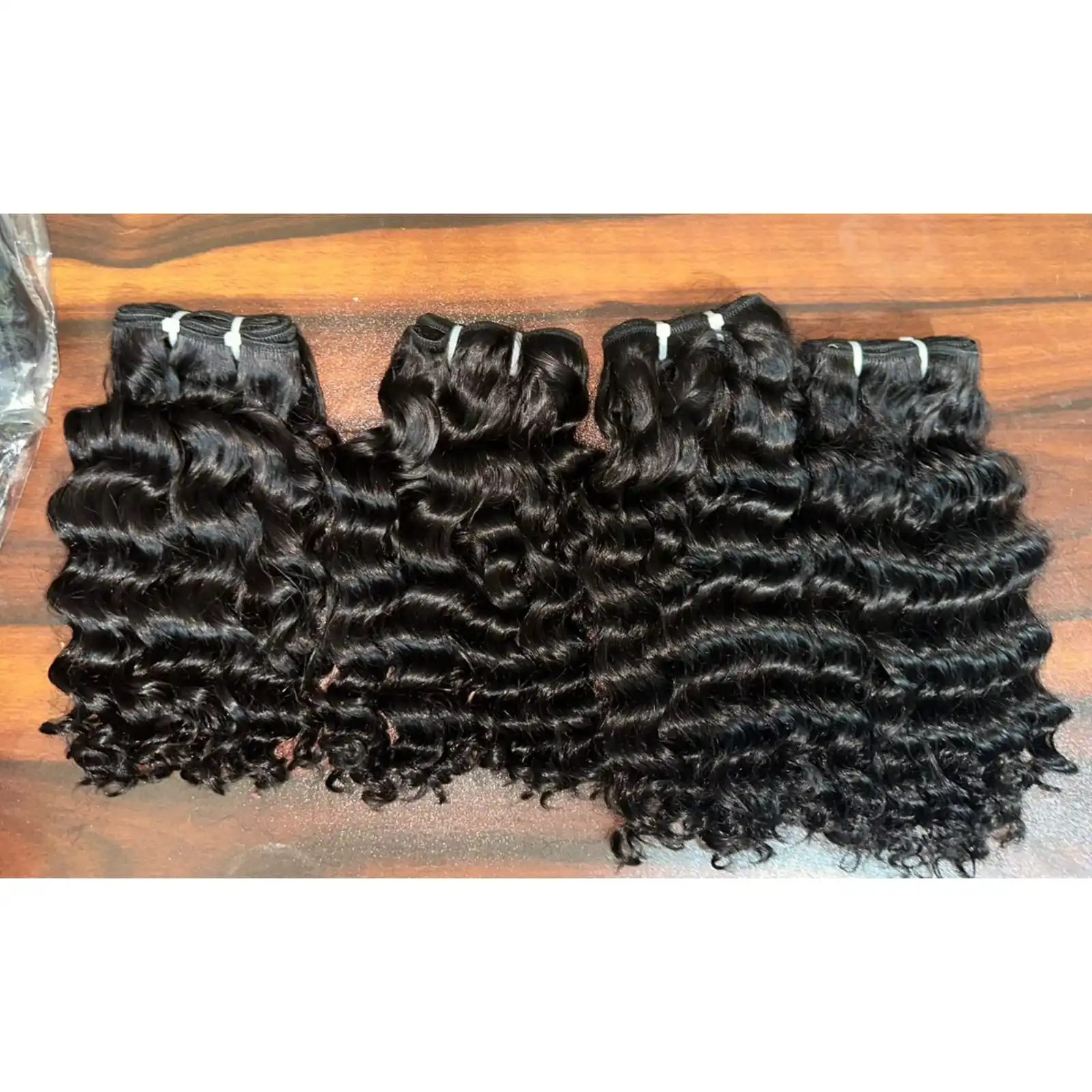 INDIAN NATURAL CURLY SOUTH TEMPLE HAIR EXTENSIONS CAN BE BLEECH UP TO 613 BLONDE