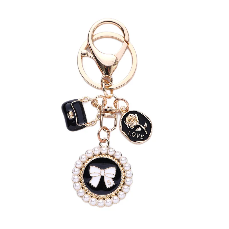 Cute bow Pearl Keychain pendant Creative Rose Bag Accessories Fashion key chain headphone cover bag decoration