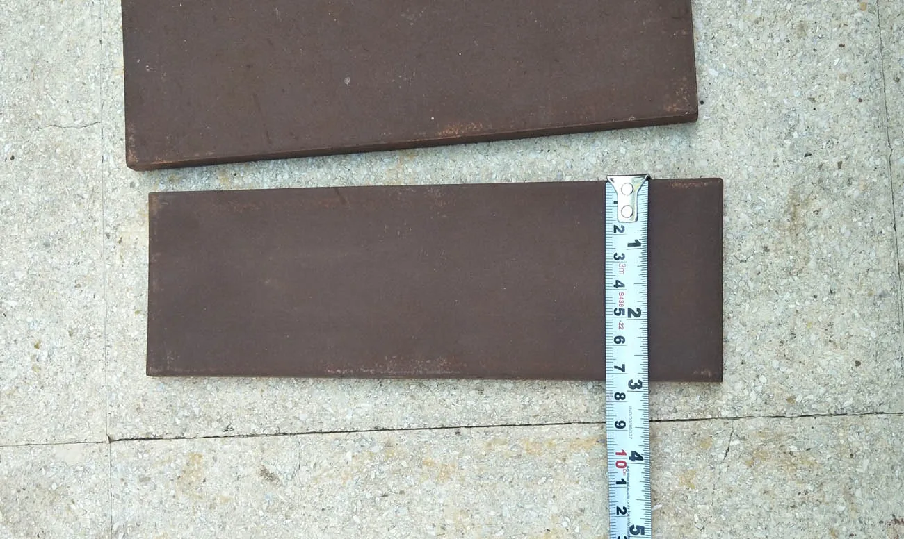 Brown clay terracotta wall cladding and clay floor tiles for garden indoor outdoor floor and wall brick covering cladding