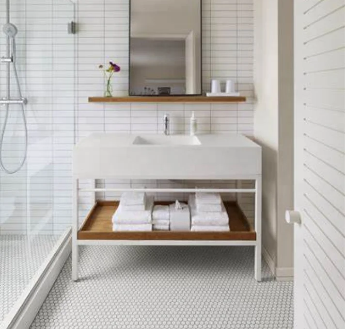 signature design combining hallway closet and bathroom into one luxurious dressing area High end hotels retro baths synonymous