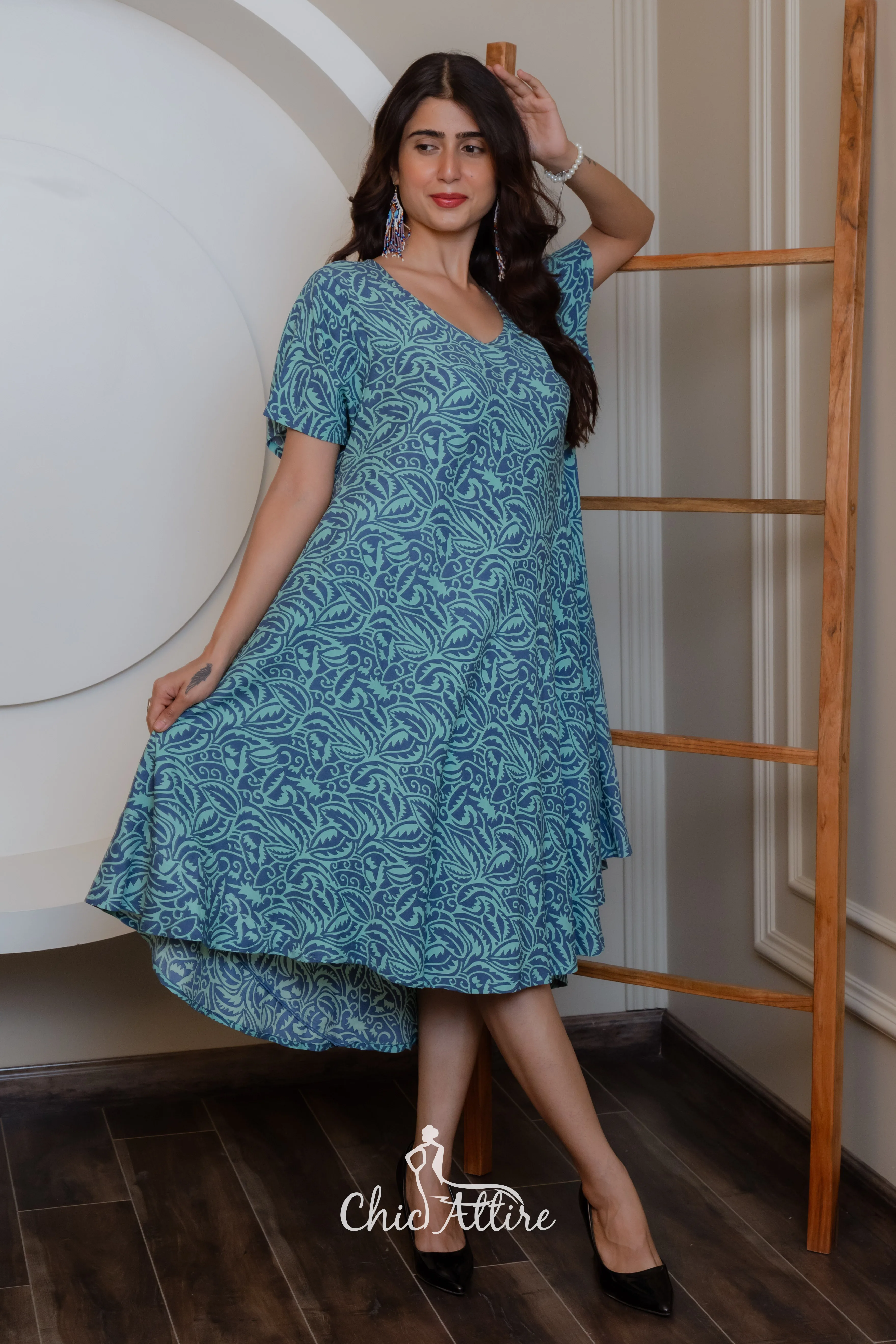 Stylish Teal White Swirl Pattern Midi Dress Ruffled Hemline Short Sleeves Neckline Comfortable Light Flowy Fabric Casual Summer