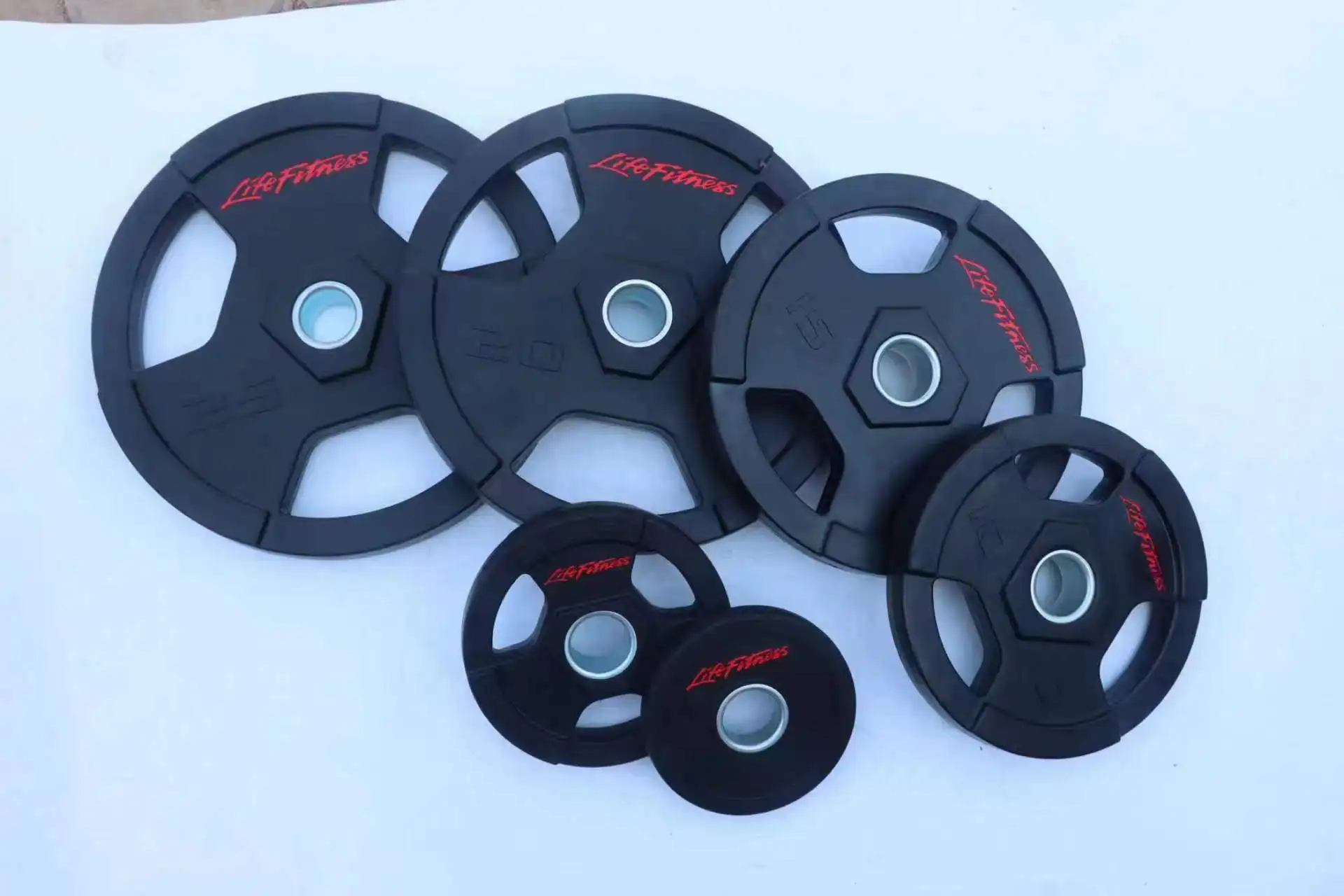 2024 new 5kg/10kg/15kg/20kg /25kg Cheap Gym three-hole sheet hand-grab sheet gym dedicated home PU barbell weight plates