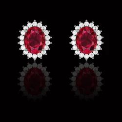 A beautiful pair of cushion cut Intense Red ruby earrings. 5 carats of Ruby 1.8 carats of white round brilliant cut diamonds