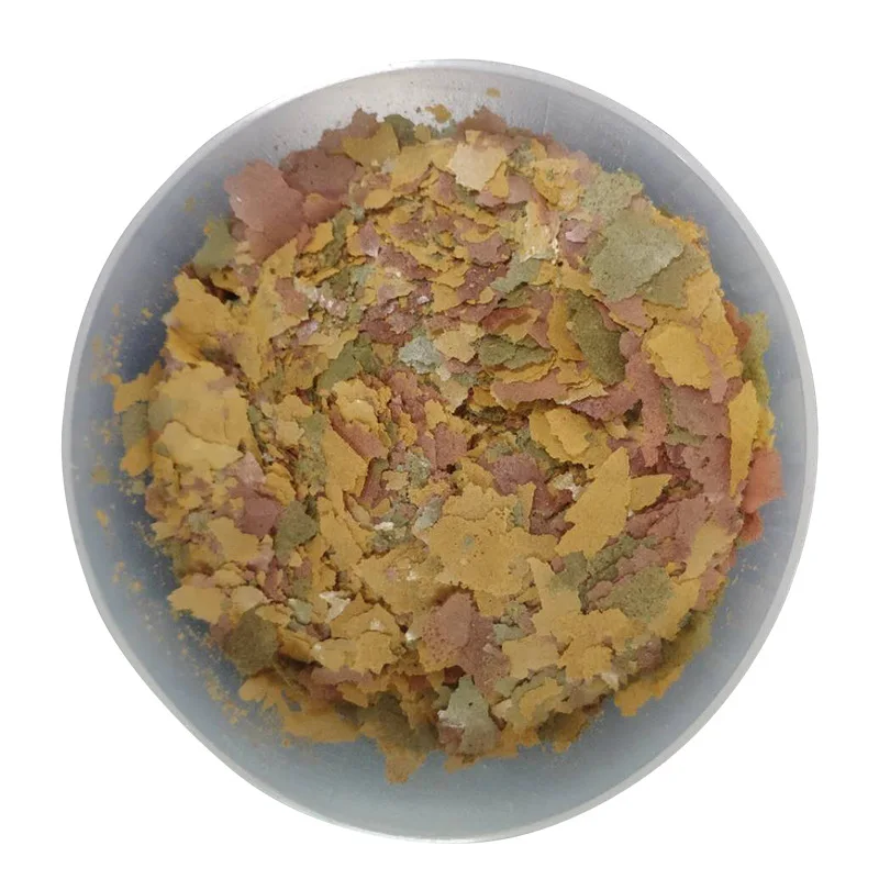Highly nutritious and high protein flake fish feed, small tropical ornamental fish colorful goldfish feed in bulk