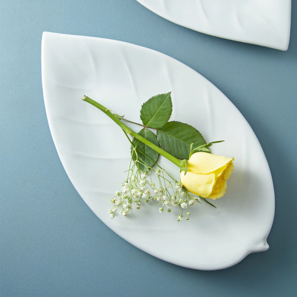 OEM twisted leaf white porcelain plate for vegetables and fruits in the buffet from Viet Nam wholesale manufacture