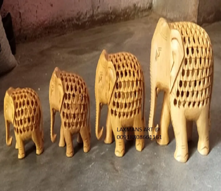 wooden carved elephant statues set 4 pcs elephant set wooden decorative elehphant statue set from india wooden elephant