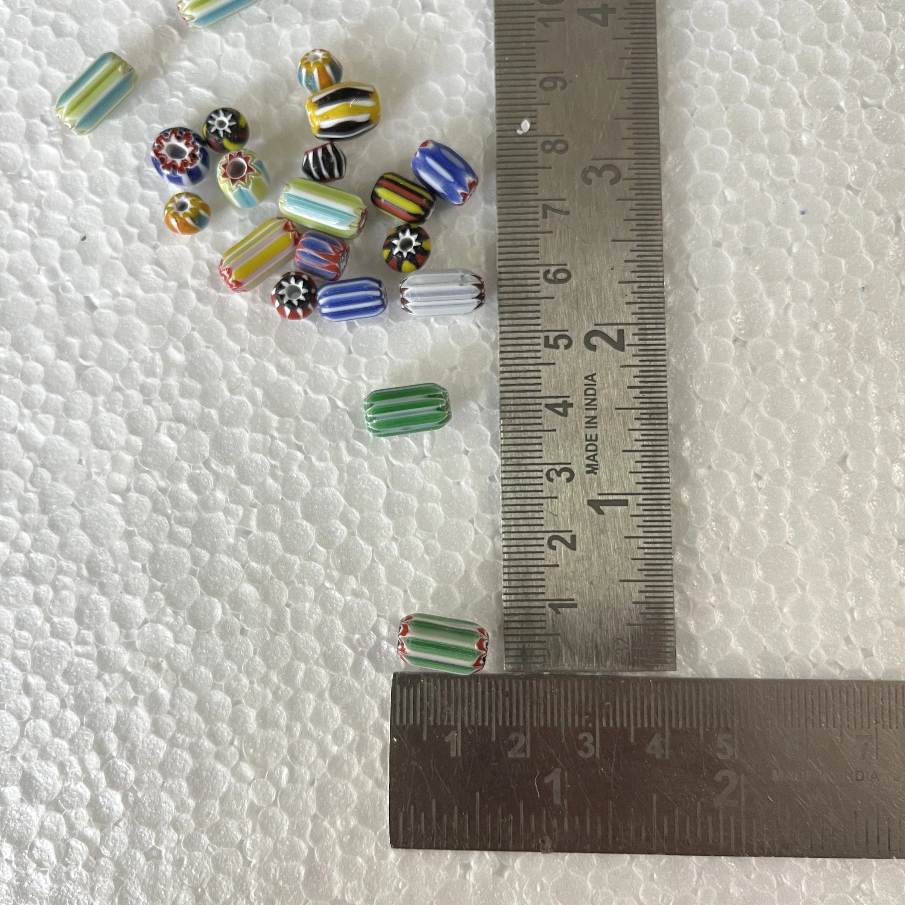 custom made glass striped chevron beads with blue & red coloured stripes idea for resale by bead stores and jewelry designers