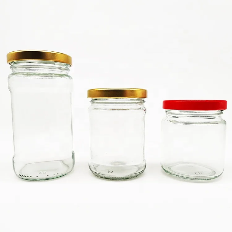 Wholesale 200ml 300ml Round Glass Honey Jar and Golden Metal Lug Guacamole Peanut Butter Glass Jar with Twist Off Lid