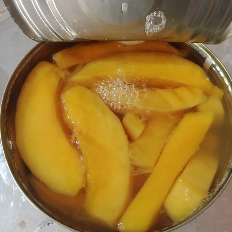 VIETNAM CANNED KAEW MANGO SLICES PULP IN LIGHT SYRUP A10 TINS, CHOICE QUALITY, YELLOW COLOR, OEM PACKING FROM OWN MANUFACTURER