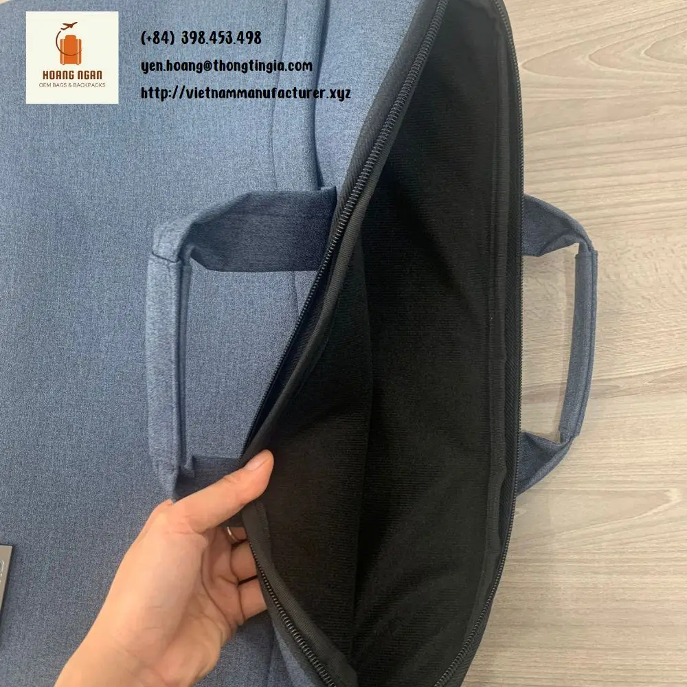 Vietnam OEM laptop bag for men with waterproof polyester handle trap and shoulder trap Thick impact resistant lining