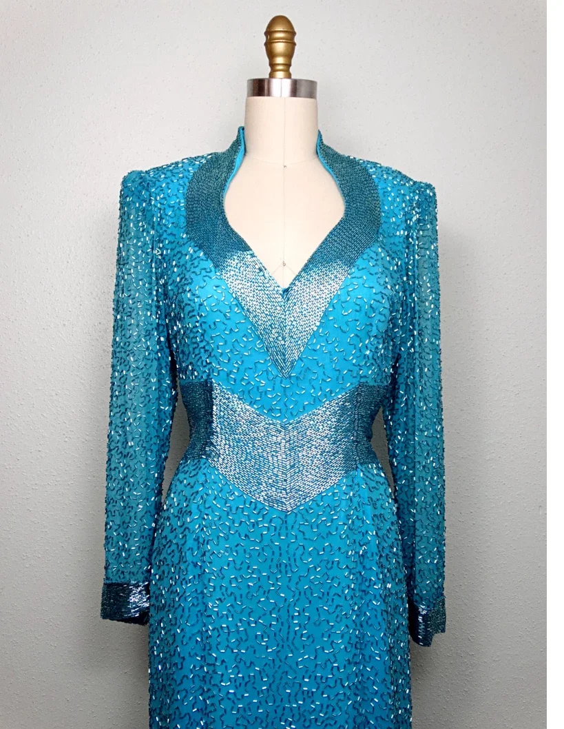 Hot Luxury Hand Embroidery White Sleeveless Sequins and Beads Floral pattern with Train Wedding Gown