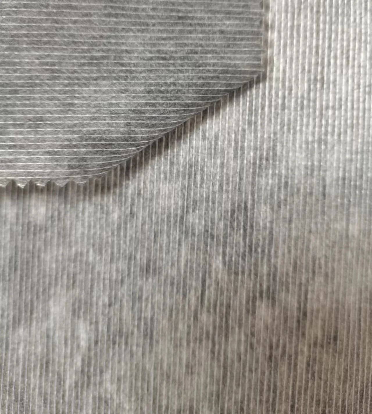 Low price factory Polyester/Nylon reinforced stitch bond Interlining nonwoven buckram fabric fusing brushed for suits downjacket