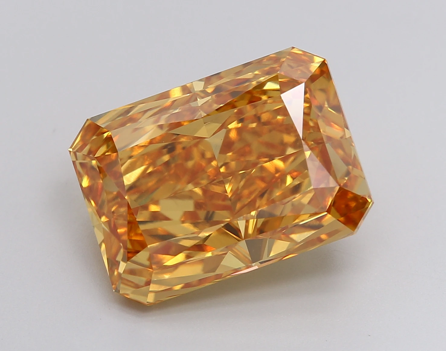 Experience luxury with this high quality Radiant 10.12ct Fancy Vivid Yellow Colored CVD Lab Grown Diamond piece of jewelry
