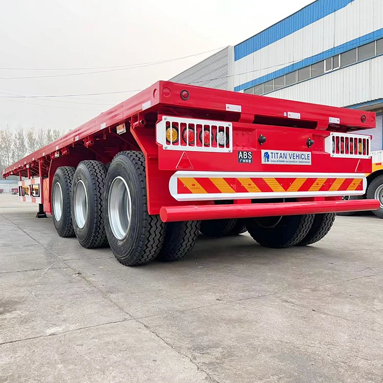 Hot Sale 3/Tri Axle 20 Ft 40 Foot 3 Axle Flatbed Container Semi Truck Trailer for Sale in Tanzania Dar Es Salaam