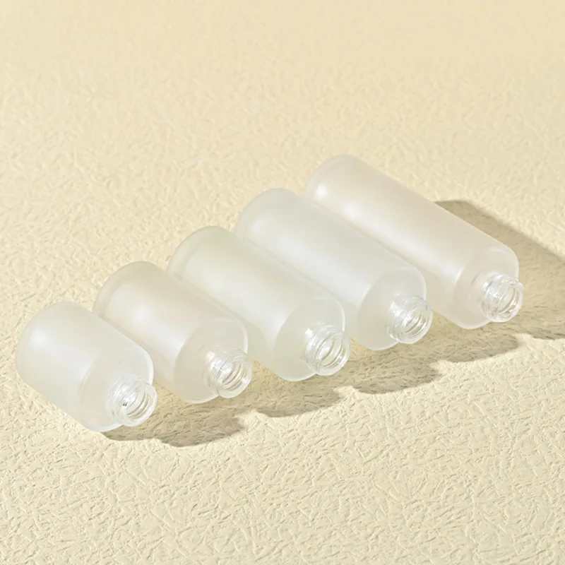 Custom Logo Printed Frost Glass Bottle with Flat Shoulder Serum Empty Clear Dropper Cylinder Shape 15ml 30ml 100ml Capabilities