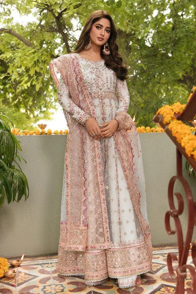 stylish Pakistani & Indian dresses, featuring top-quality and heavy embroidery for exquisite partywear.