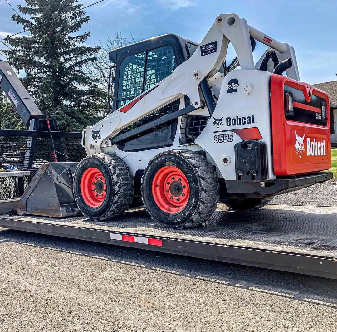 Новый погрузчик с руловым погрузчиком Bobcat S450