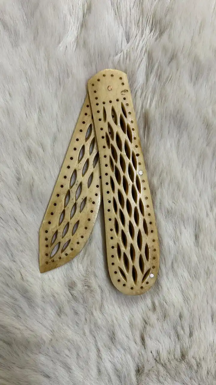 custom made hand carved bone letter openers ideal for resale by stationers and paper stores