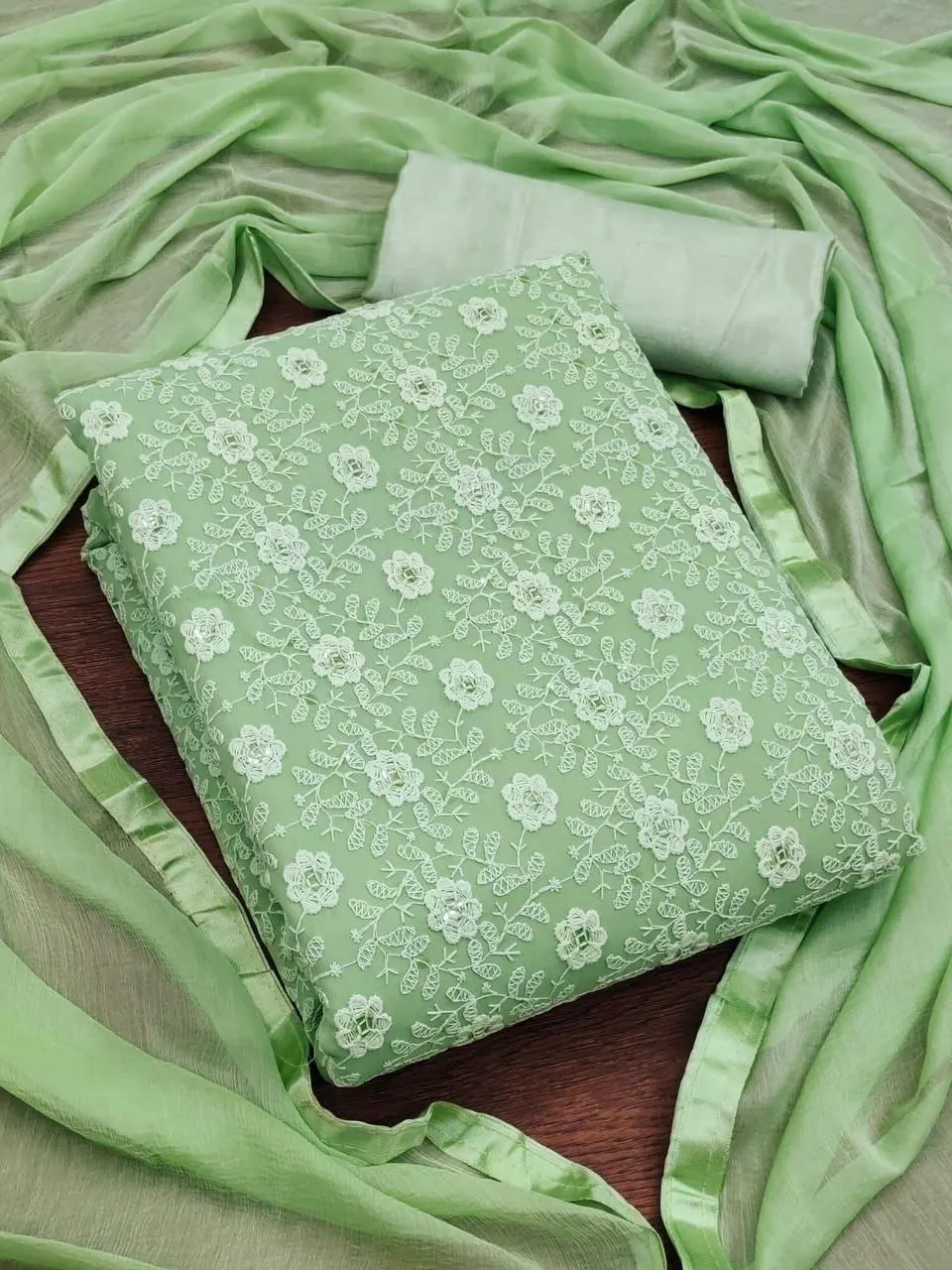 geoegette sequenece dress materials suit with siffly work