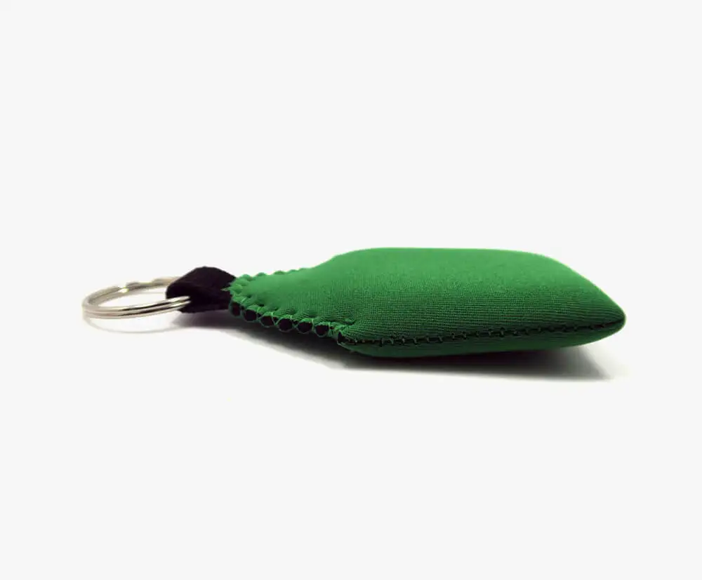 Neoprene Keycain Self Defense Set With Pom Pom Keychain Side View Green Floating Neoprene Keyrings