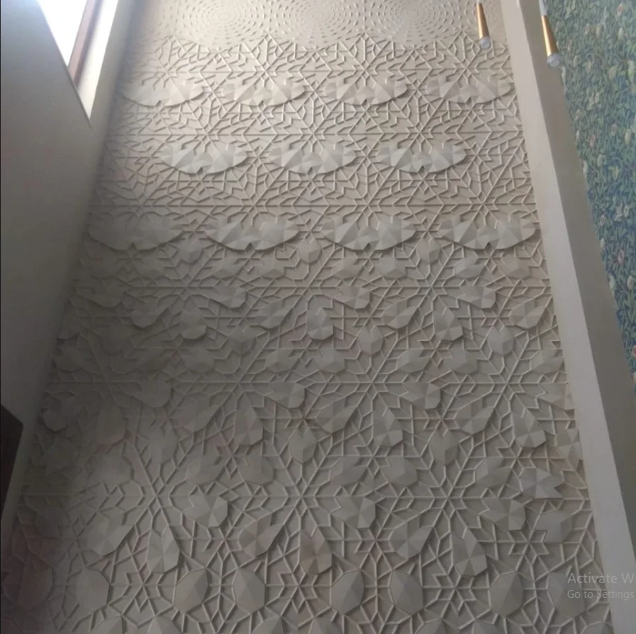 Carved marble wall panel