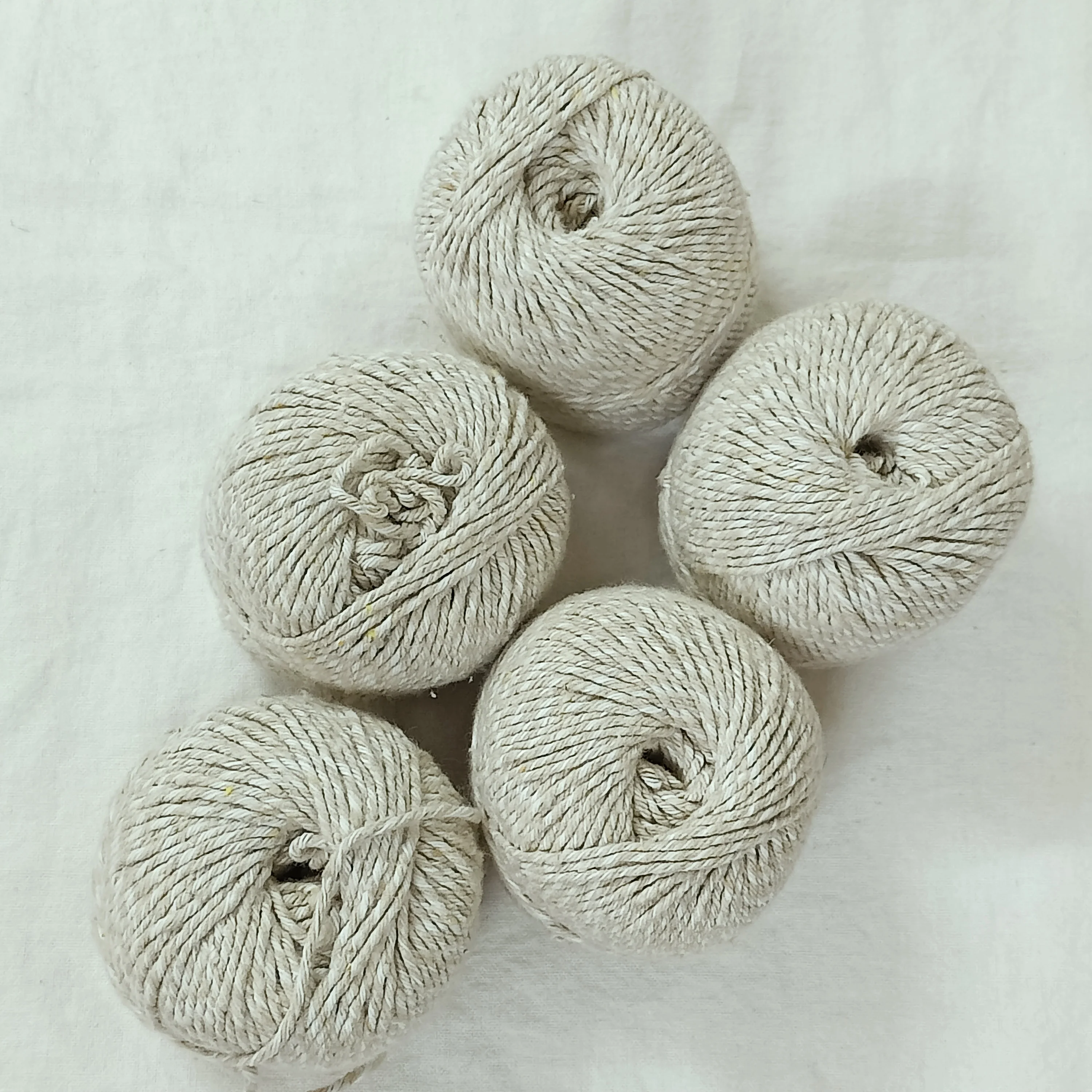 natural nettle fiber yarn  made with bleached and unbleached fibers available in 50 gram and 100 gram balls
