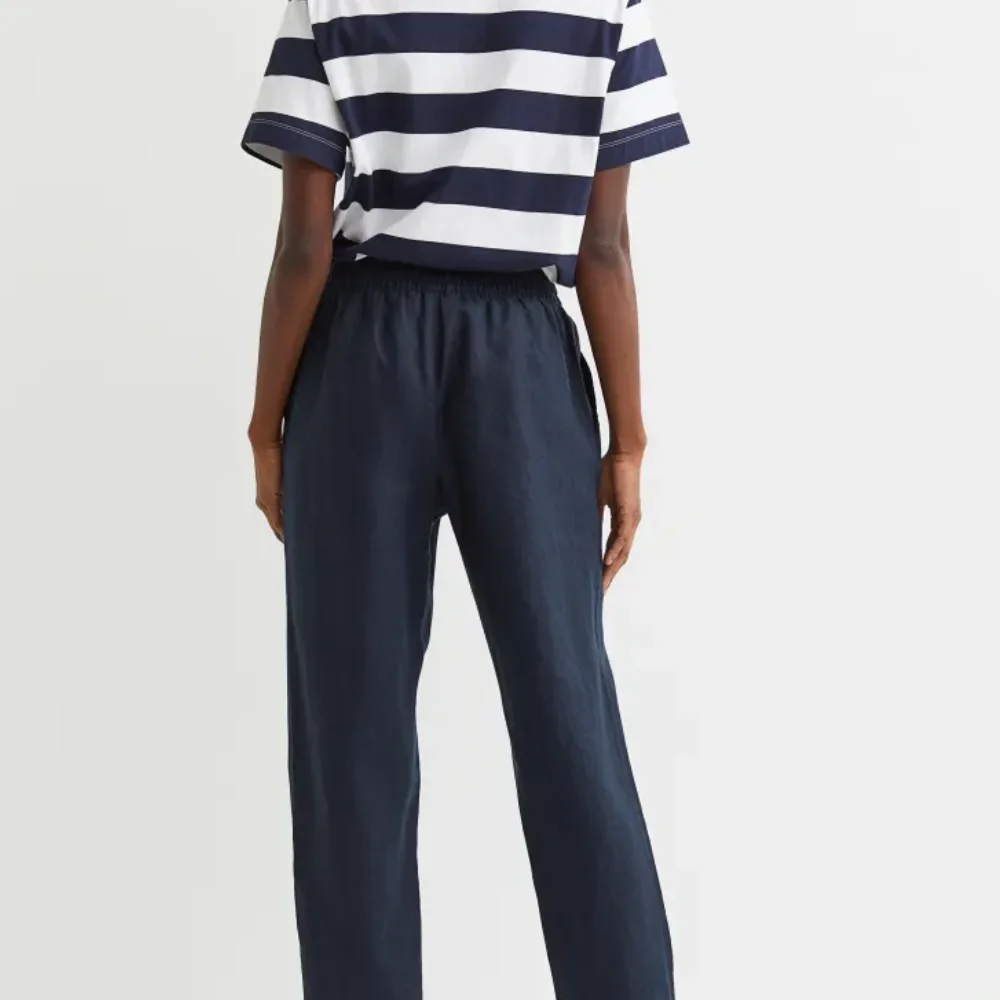 Wholesale Women White Cotton Satin Pakistani Trousers Embroidered At Bottom Hem custom size packing