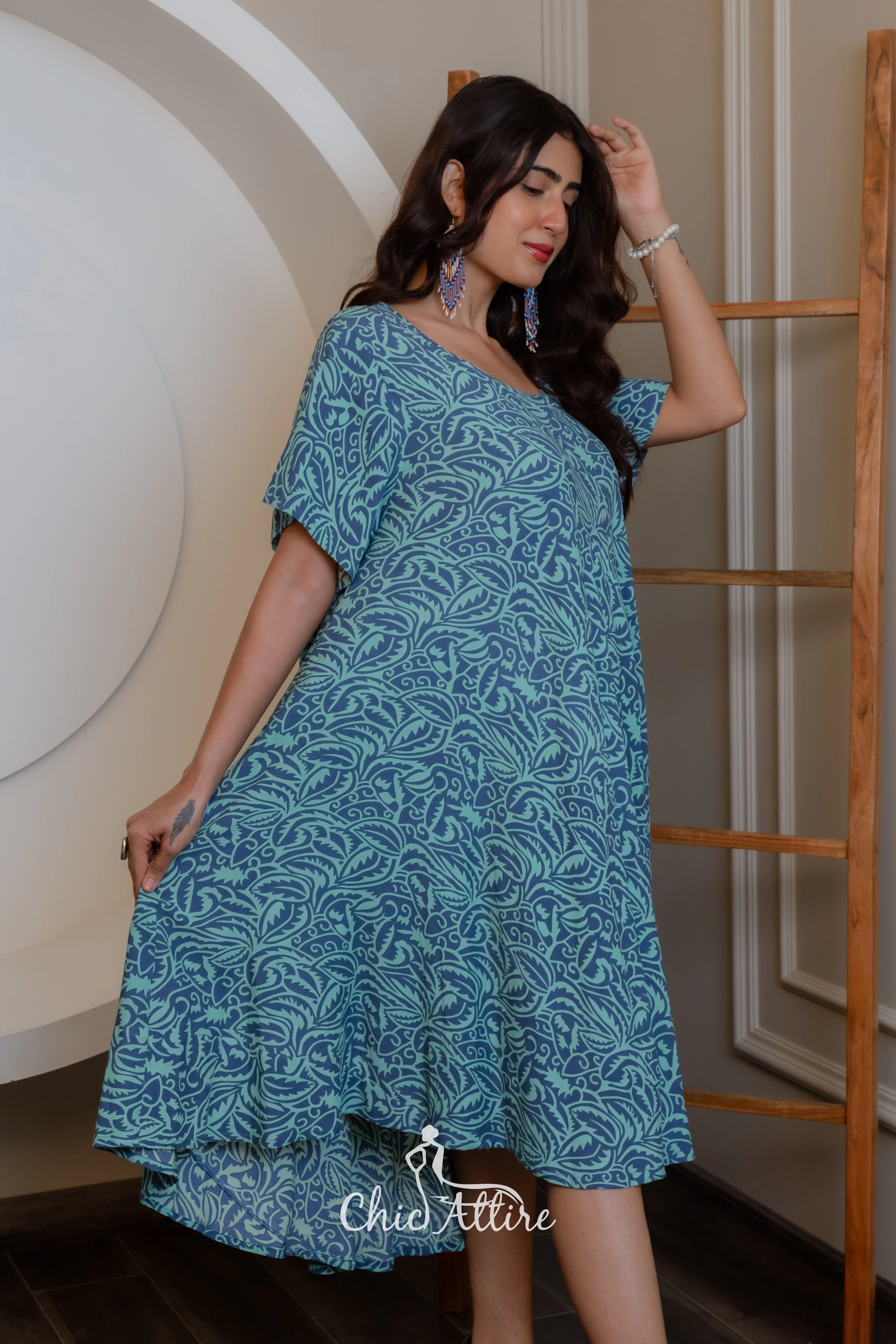 Stylish Teal White Swirl Pattern Midi Dress Ruffled Hemline Short Sleeves Neckline Comfortable Light Flowy Fabric Casual Summer