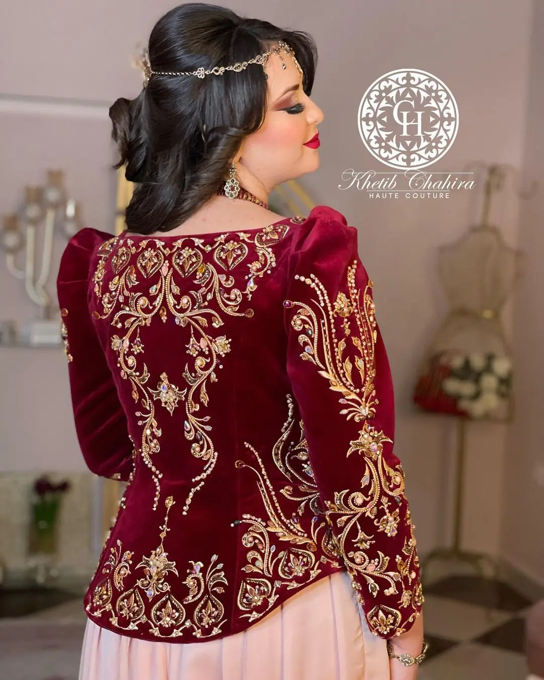 Takchita two-piece traditional Moroccan-style dress often worn by Algerian brides, consisting of an inner and outer dress.