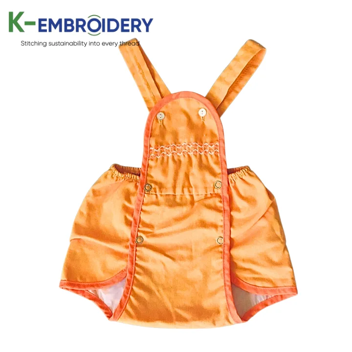 Красивые оранжевые однотонные комбинезоны с вышивкой