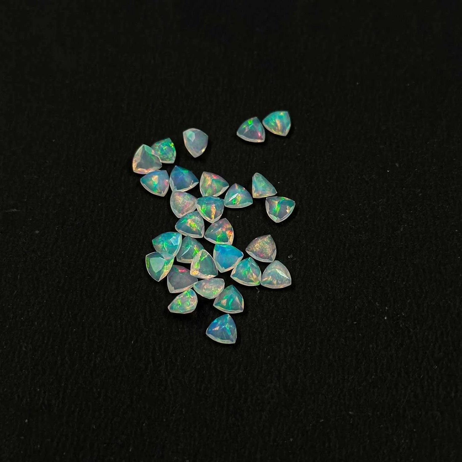 AAA Quality Rainbow Ethiopian Opal Faceted Trillion 4mm Loose Calibrated Gemstone Wholesale Price For Jewelry Setting Buy Online
