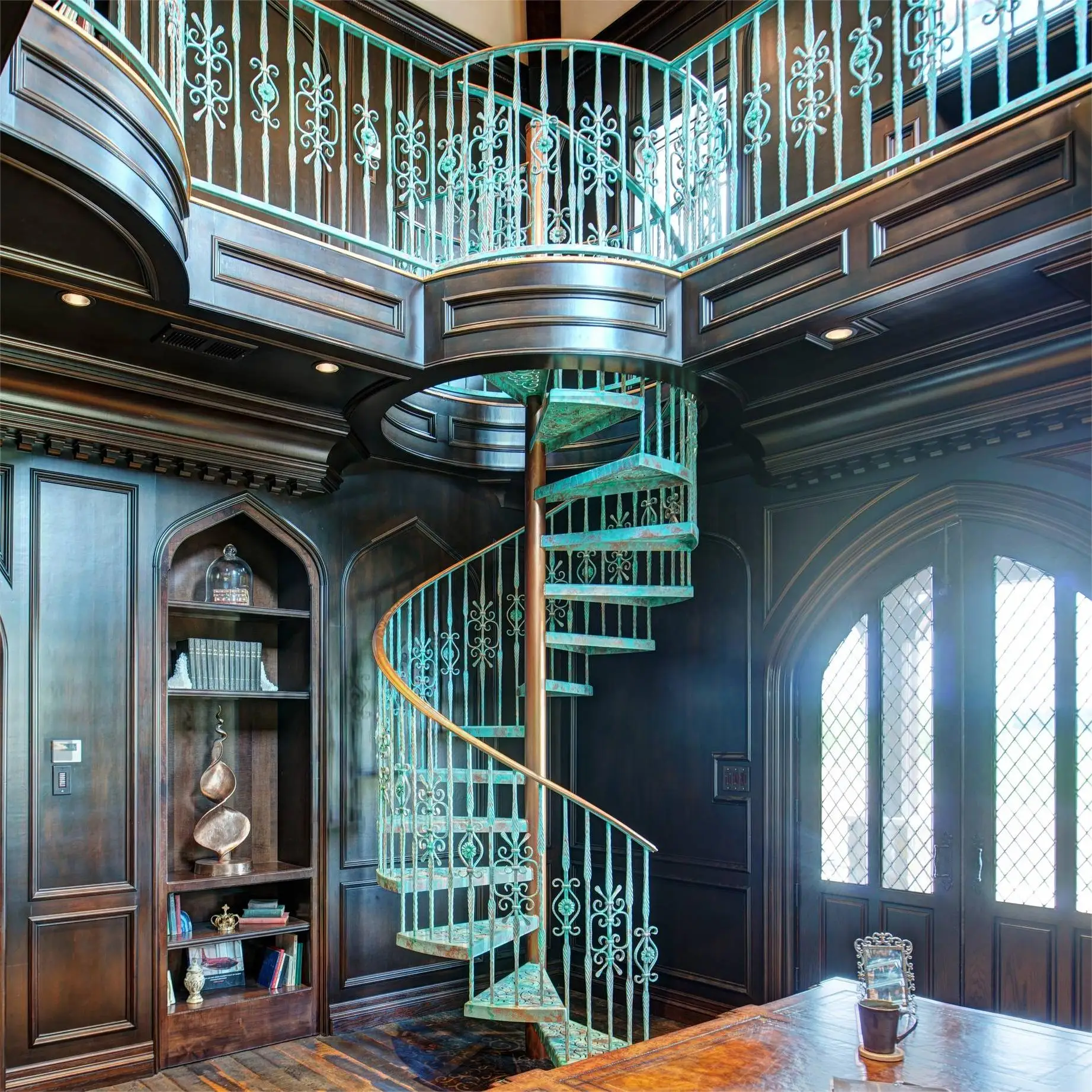 Foshan Durable Stairs Carbon Steel Beam Spiral Staircase with Wrought Iron Guardrails Wooden Tread Customized Interior Stairs